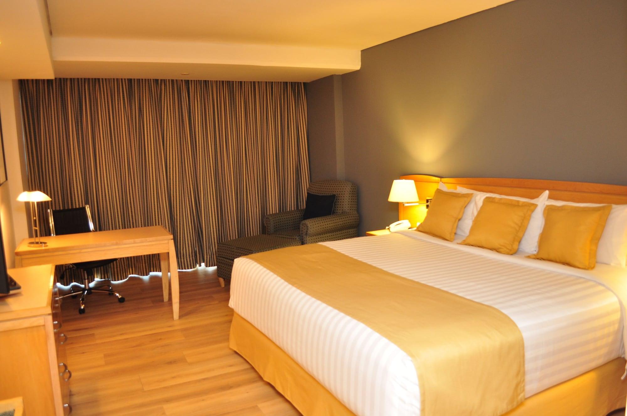 Radisson Paraiso Hotel Мехико Экстерьер фото A room at the hotel