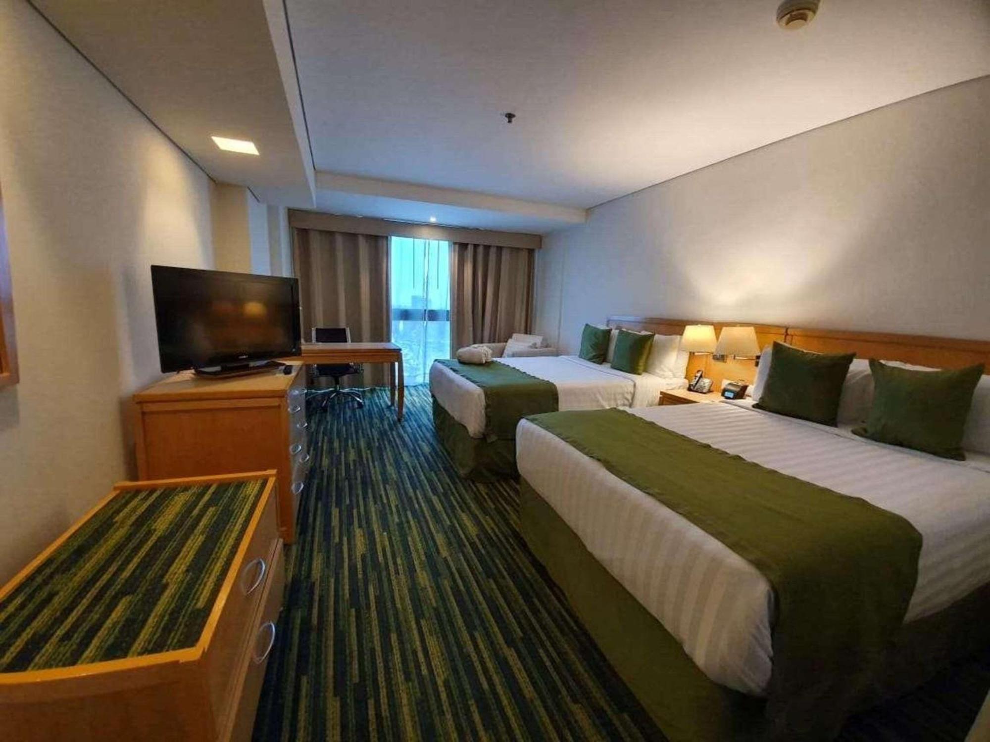 Radisson Paraiso Hotel Мехико Экстерьер фото A room at the hotel