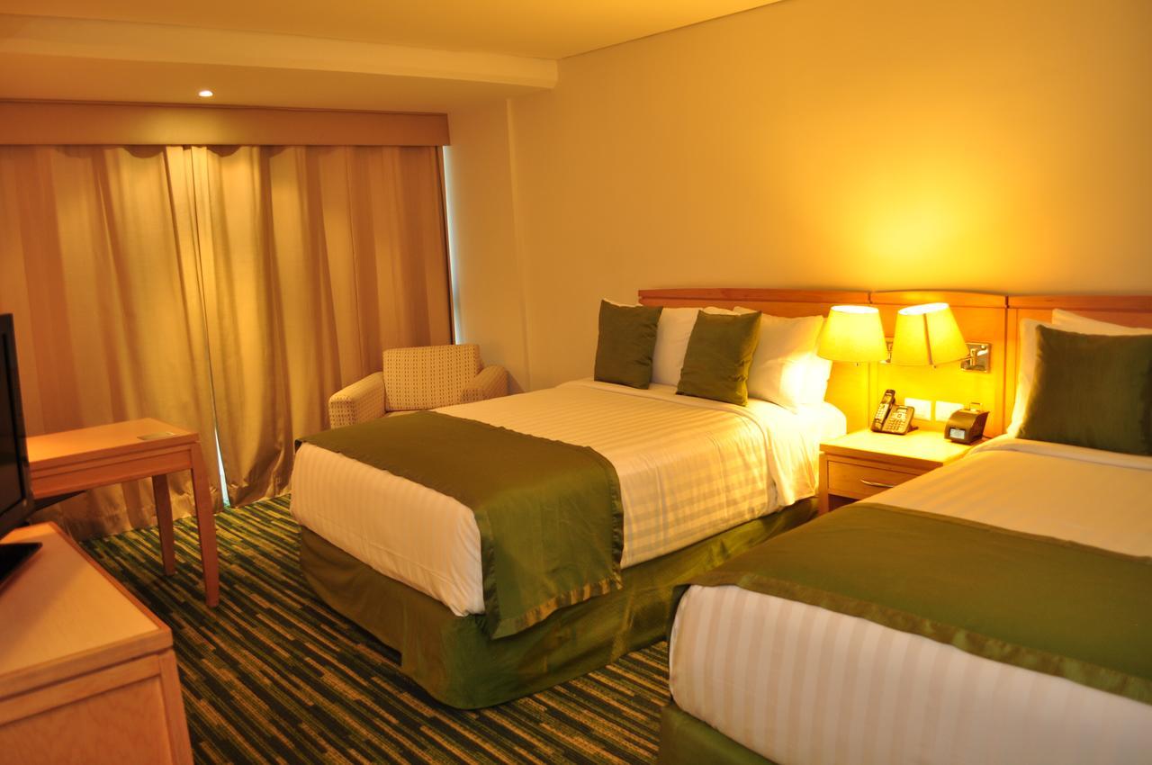 Radisson Paraiso Hotel Мехико Экстерьер фото A room at the hotel
