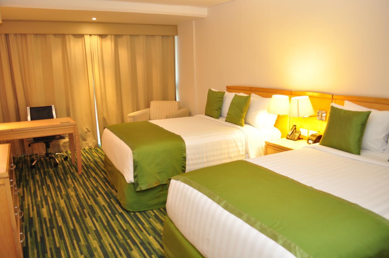 Radisson Paraiso Hotel Мехико Экстерьер фото A room at the hotel